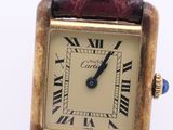 an image of a close up of a wrist watch with roman numerals