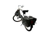 a bicycle with a bag attached to the back of it