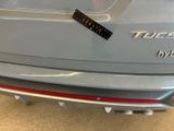 a close up of a car with a sticker on the back of it