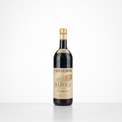 a close up of a bottle of wine on a table