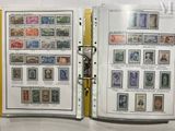 a lot of stamps on the pages of a book
