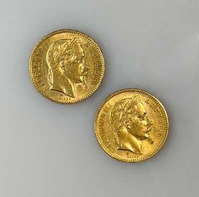 two gold coins with a portrait of a man and a woman on them