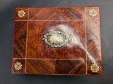 an image of a wooden box with a clock on it