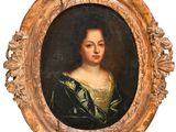 portrait of a woman in a green dress in a gold frame