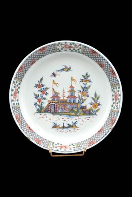 a plate that has a picture of a castle on it