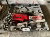 a box with tools in it sitting on the floor
