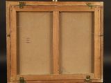 a close up of a wooden easel with a painting on it