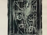 a black and white drawing of a face on a piece of paper