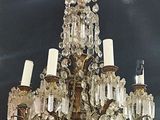 a chandelier hanging from the ceiling in a room