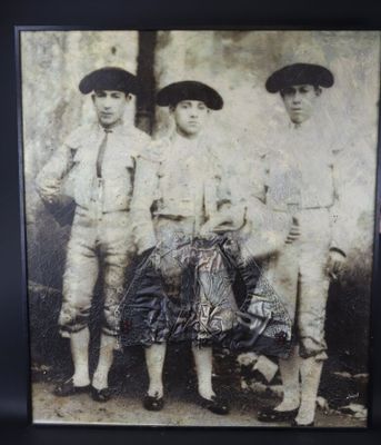 an old photo of a group of young boys standing next to each other