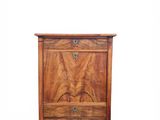 a wooden chest of drawers with two drawers on one side and two drawers on the other