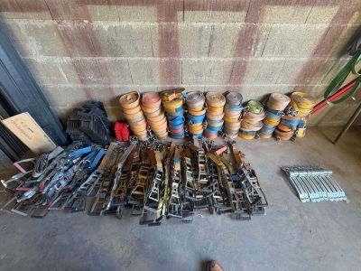 many different types of pipes and hoses on the floor