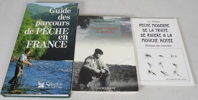 two books are sitting on a table next to each other