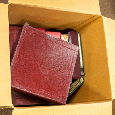 a box full of books sitting on the floor