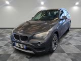 une photo d'une BMW X1 dans un showroom