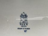 a picture of a plate with a castle on it