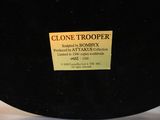 a close up of a black bowl with a label on it