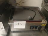 stainless steel counter top with a fryer on it with a price tag on it