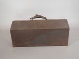a small brown box with a handle on it