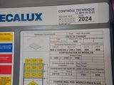 a sign on the side of a building that says decalux
