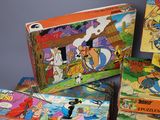 a lot of cartoon books that are on the table