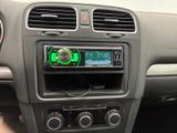 an image of a car dashboard with a radio in the center