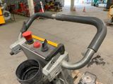 an image of a machine that is in a garage