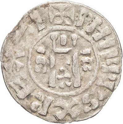 an old silver coin with a cross on it