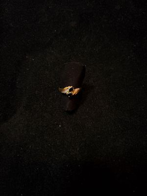 Bague en or jaune 18k, sertie de deux petits saphirs.