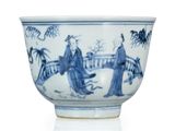 a blue and white bowl with oriental designs on it