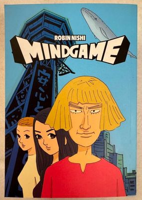 un livre de bandes dessinées sur la couverture duquel figurent deux femmes devant un immeuble