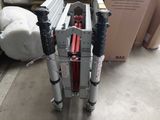 a picture of a pair of hydraulic jacks in a warehouse