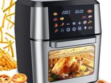 an image of an air fryer with a bunch of food inside of it