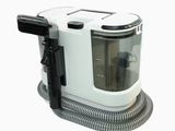 une image d'un aspirateur sur fond blanc