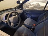 a picture of a car with a steering wheel and a dashboard