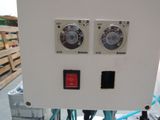 a close up of a control panel in a warehouse