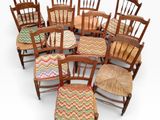 a lot of chairs that are arranged in a circle