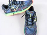 pair of new balance shoes on a white surface
