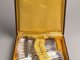 a box with a set of silverware in it