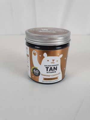 une photo représentant un pot de crème autobronzante posé sur une surface blanche