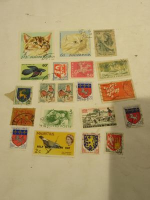 a lot of stamps that are on the table