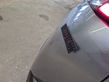 a sticker on the hood of a car