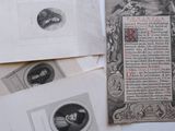 many old books with pictures on them on a table