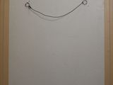 a picture of a picture of a smile drawn on the wall