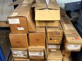 many boxes stacked on top of each other in a warehouse