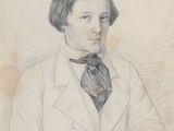 portrait d'un jeune homme en veste blanche et cravate