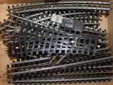 a box with a bunch of train tracks inside of it
