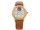 an image of a gold wrist watch with a blue moon on the face