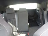 the back seats of a car are empty with no one in it