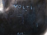 a close up of a black vase with the word volt written on it